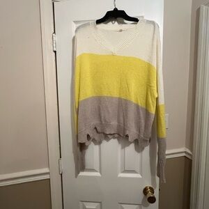 Buckle V-Neck Sweater in Cream, Yellow, and Tan